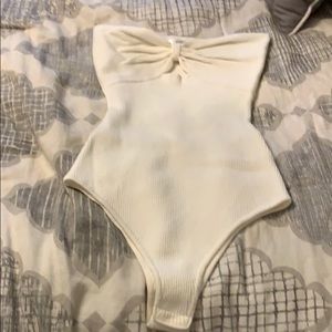 Off white body suit. NWT